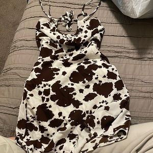 Size (S fits XS) Color ( brown/ white) Brand ( Rue 21)